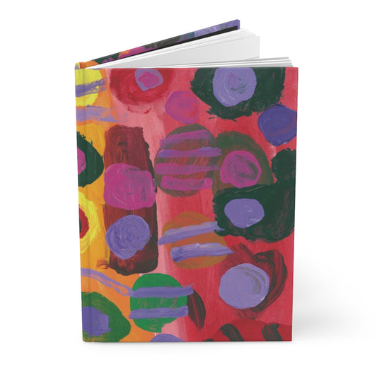 journal with pink and purple dots and lines