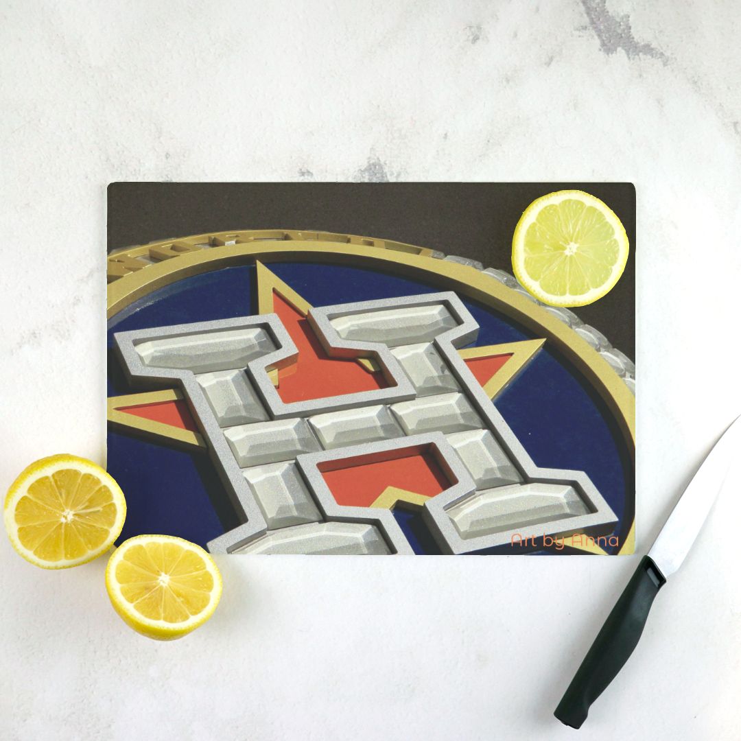 cutting board with an image of Astros Logo