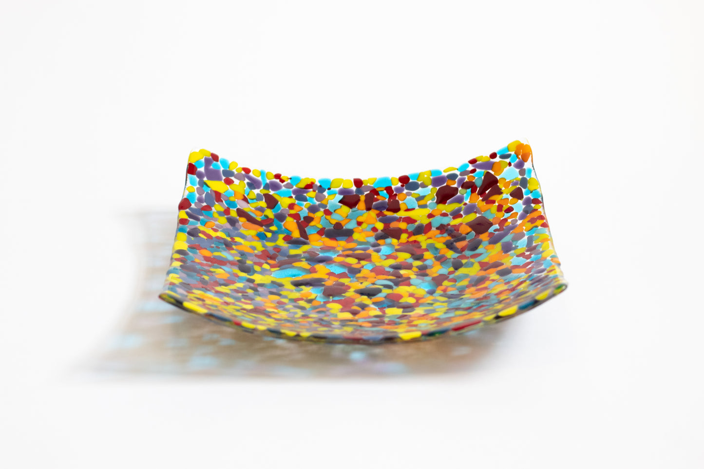 glass plate completely covered with bright colors