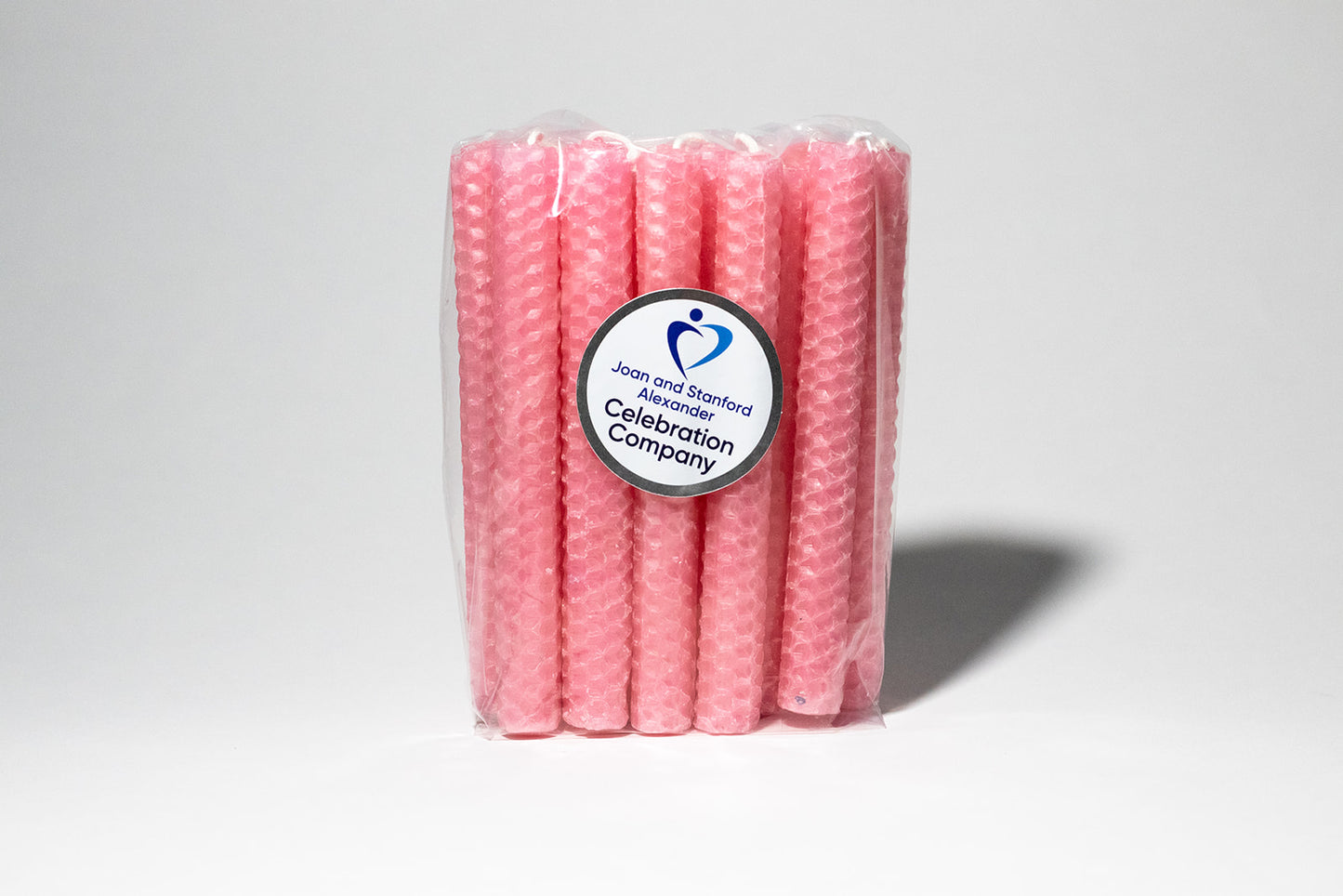 Package of 16 pink Shabbat candles in clear package