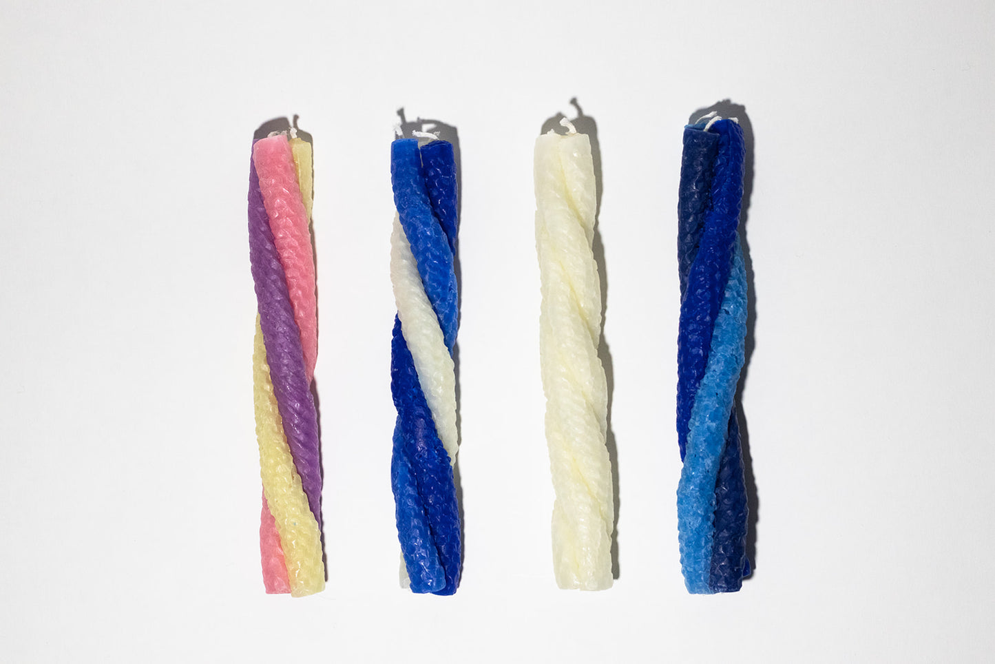 group of a variety of 4 havadalla candles