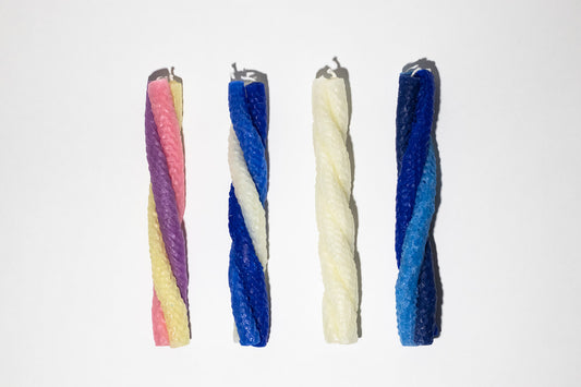 group of a variety of 4 havadalla candles