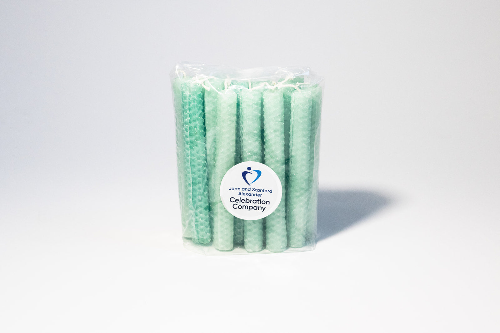 Package of 16 aqua Shabbat candles in clear package
