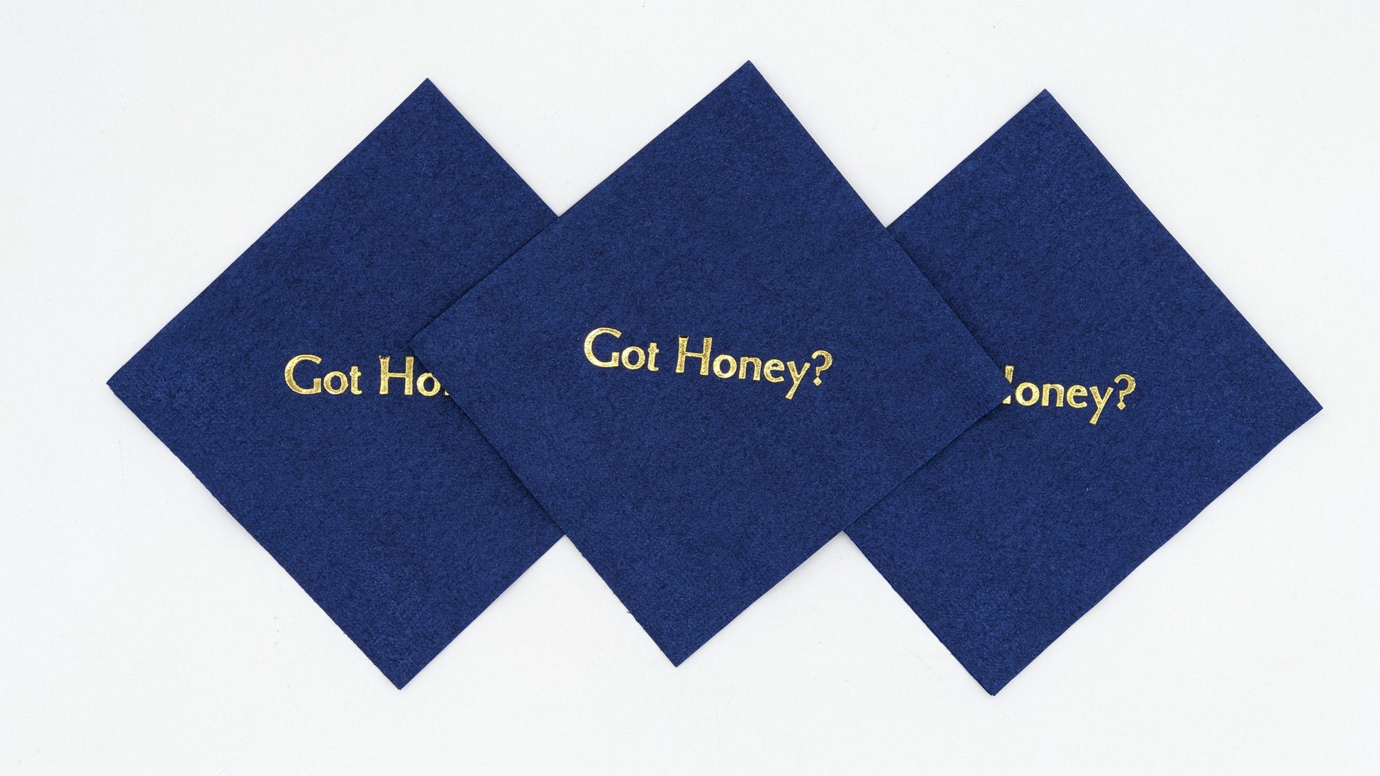 navy cocktail napkins with got honey? on it