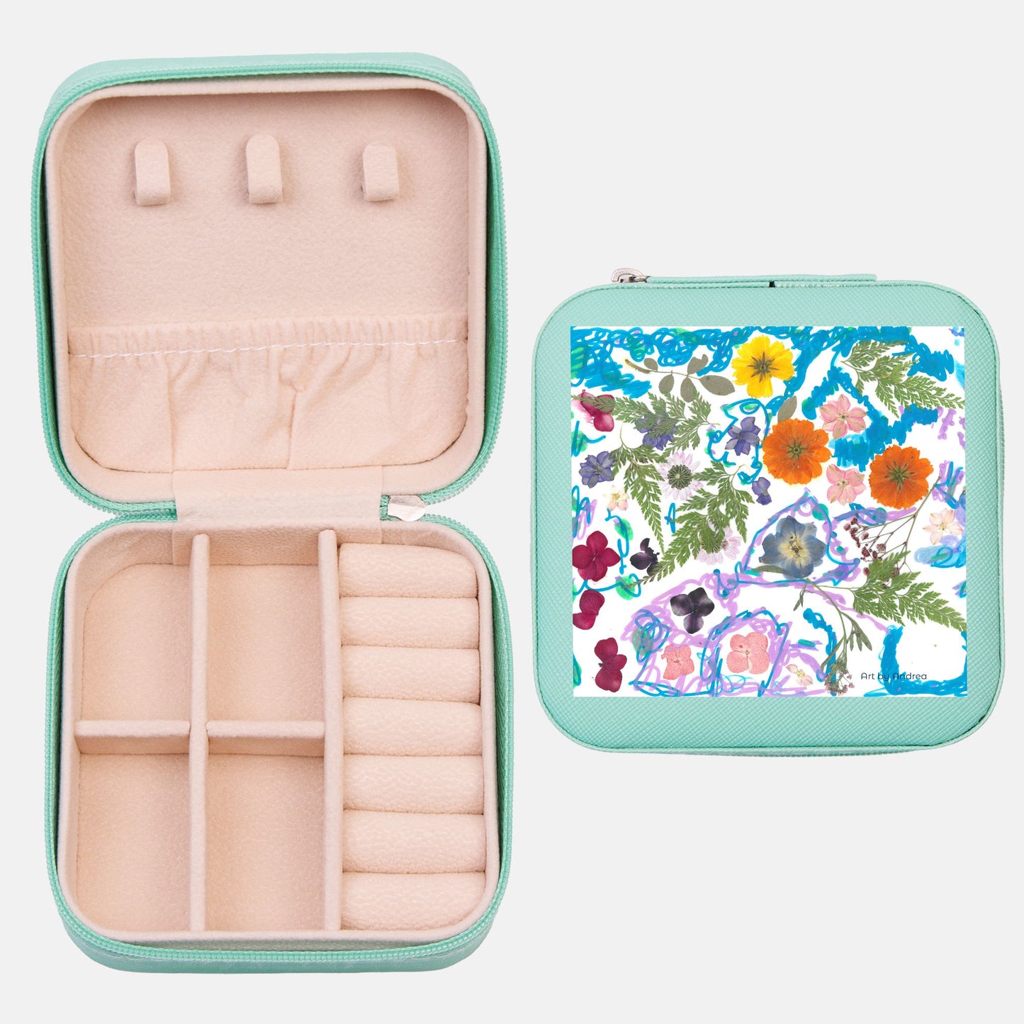 teal travel jewlery case with floral image on top