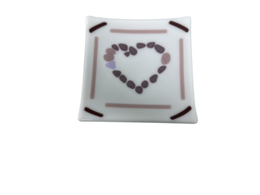 White glass wavy plate with Neutral Pastel colors on top.