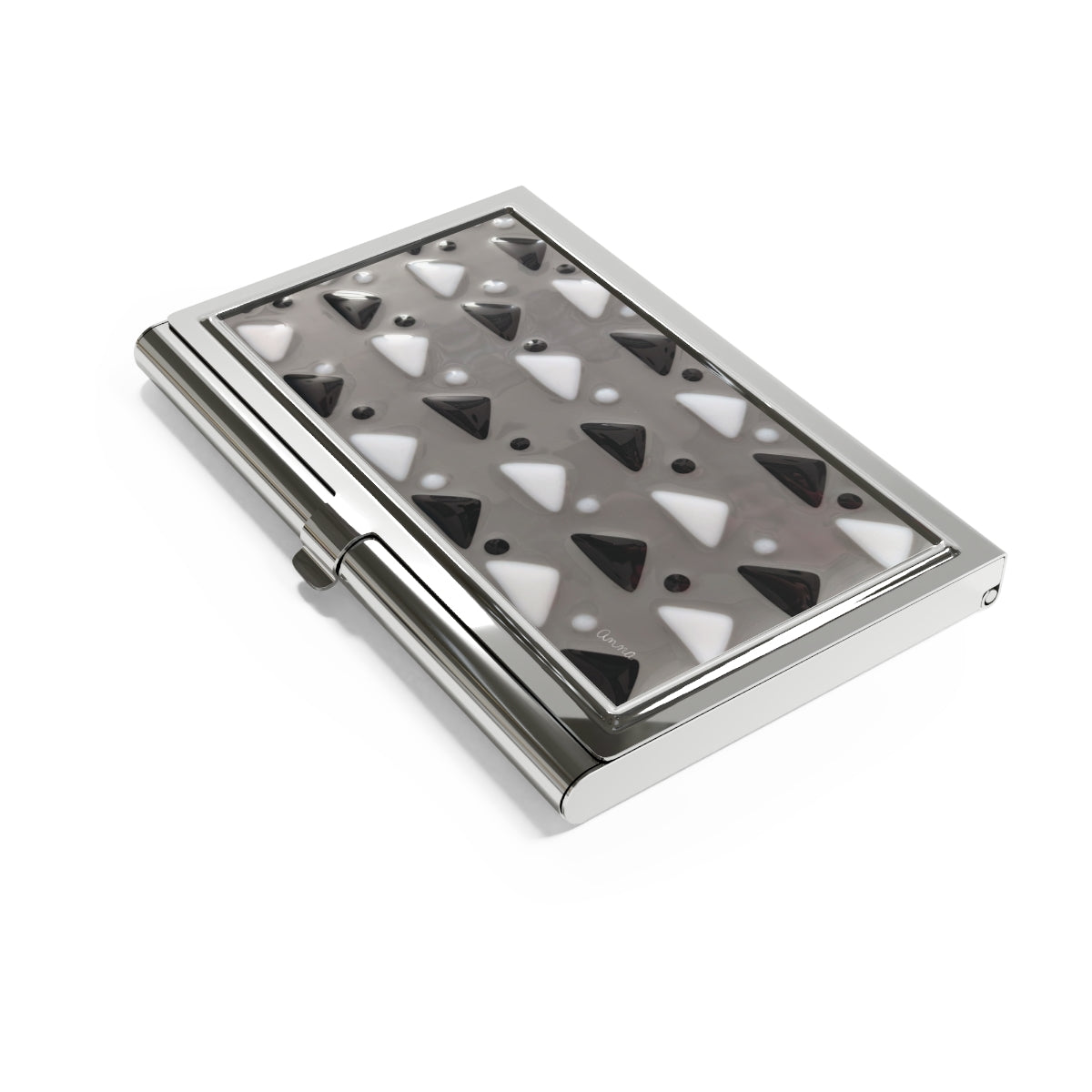 business card holder of a Gray glass square plate with black and white alternating triangles and dots in between