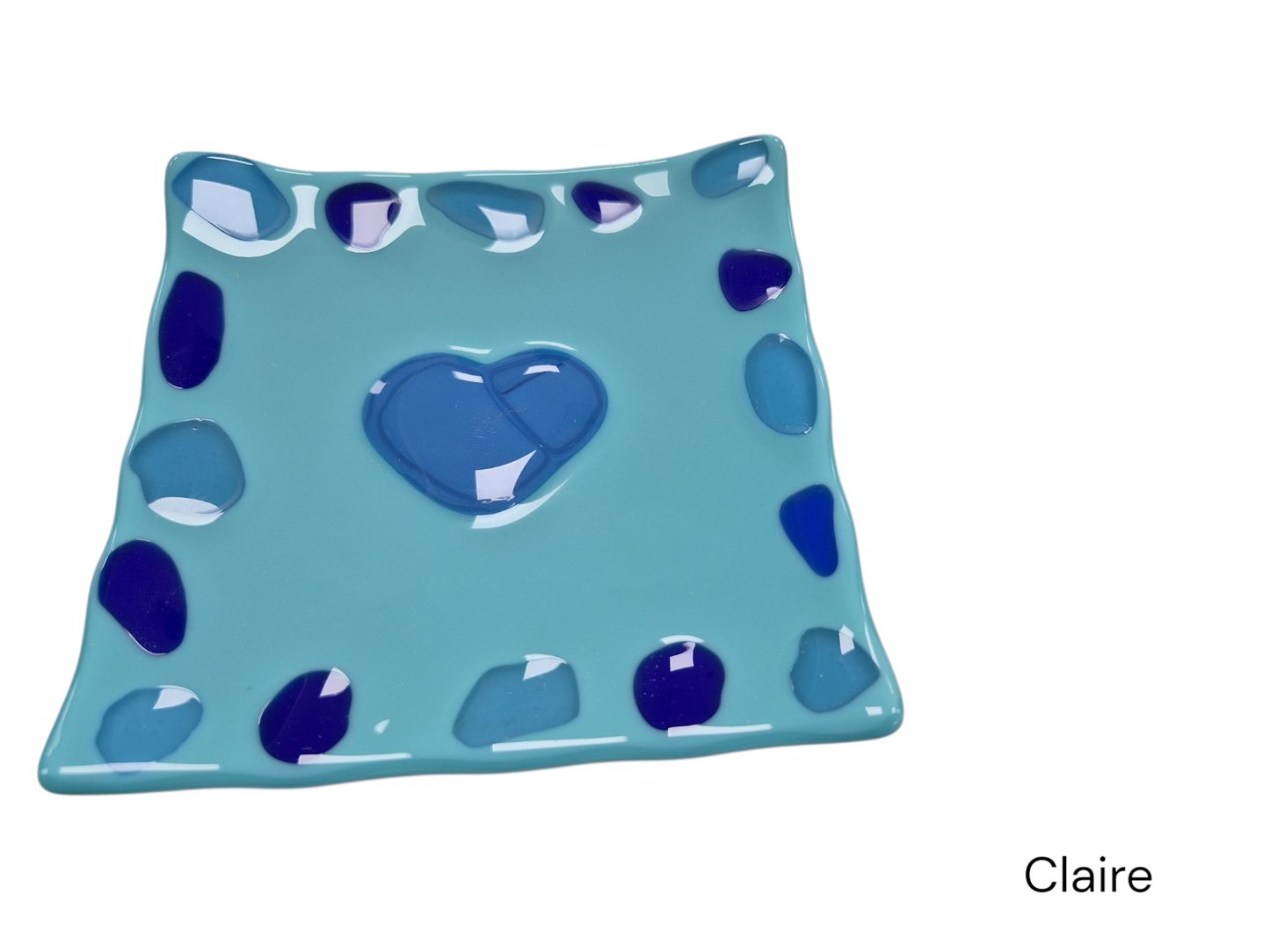 Colorful light blue glass, made by Claire. A talented employee from celebration company.