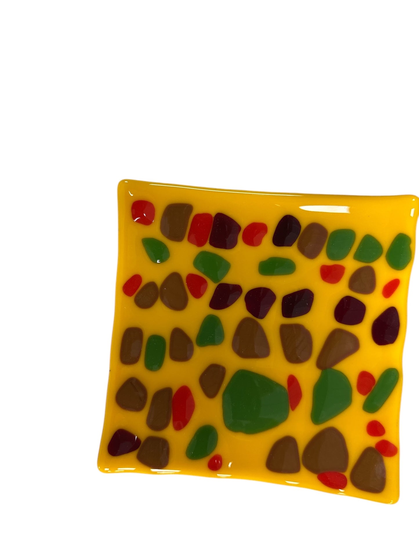 Colorful yellow glass wavy plate with colorful dots.