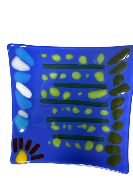Colorful Blue glass wavy plate with colorful dots.