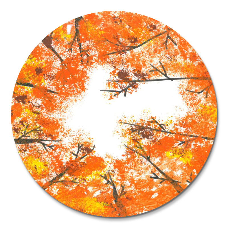 round cutting board with image of fall trees in a circle