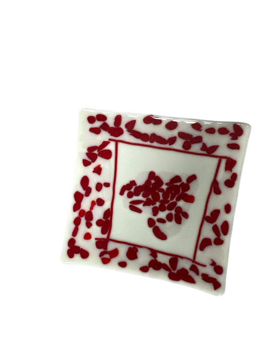 White tray with red dots