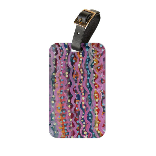 luggage tag with abstract pattern of waves and dots