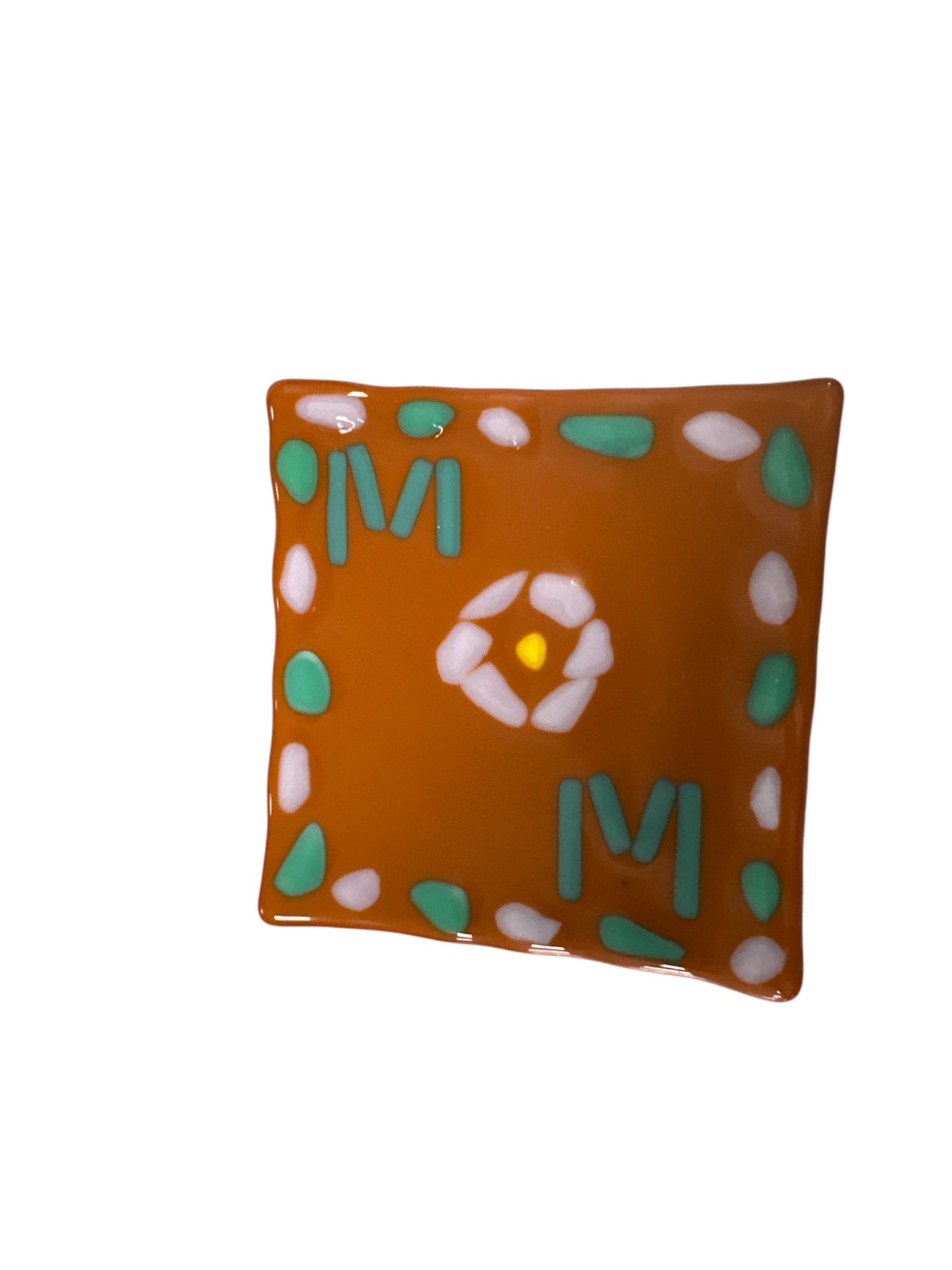Brown glass dish with Mom written diagonally.