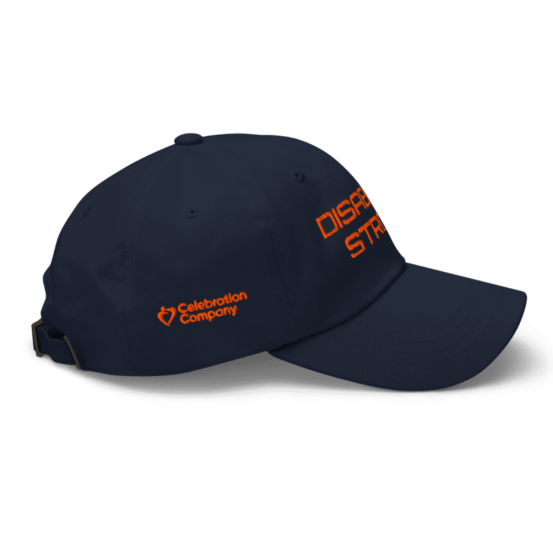 navy baseball cap with orange embroidered saying "disability strong"