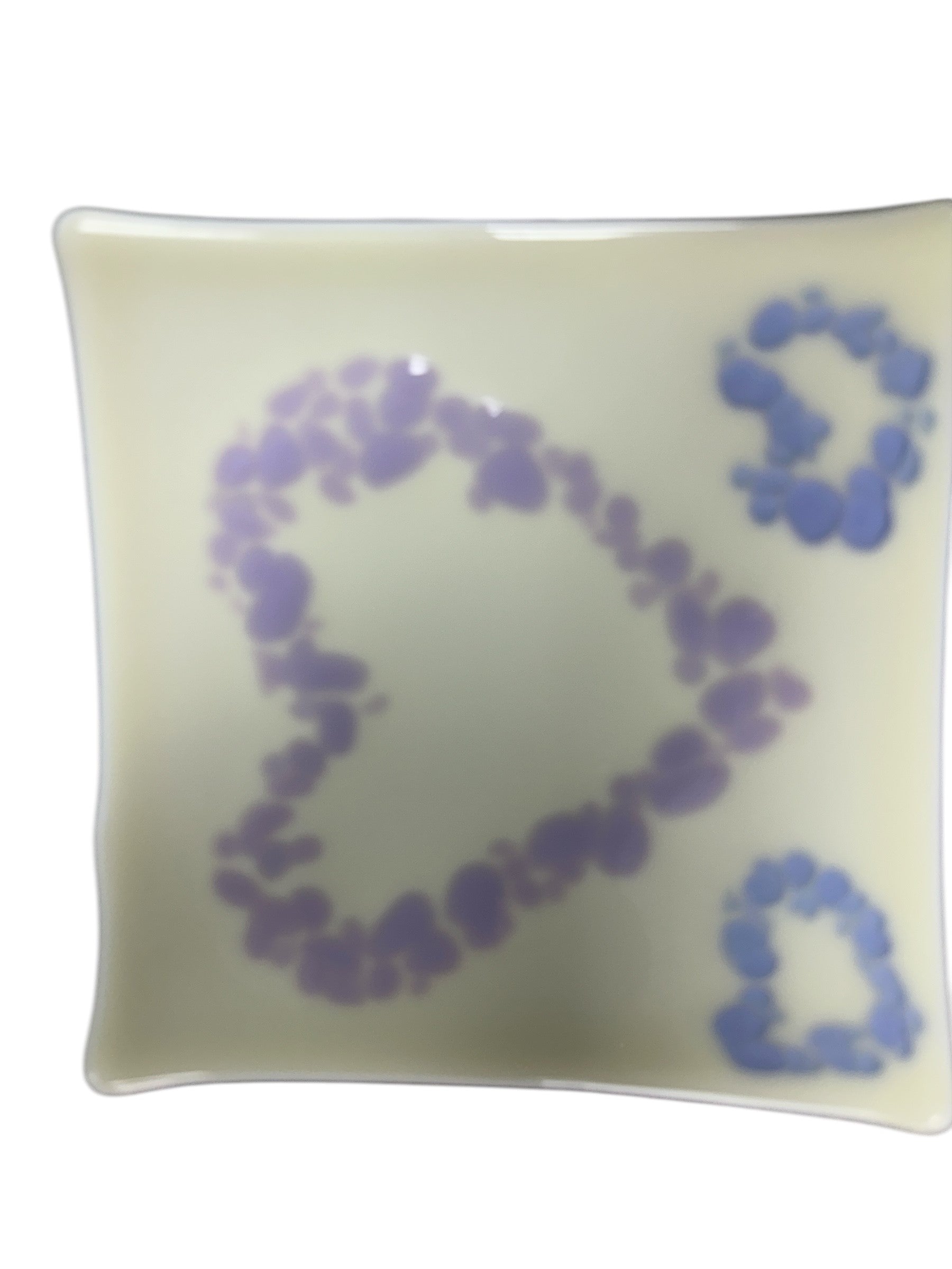 White glass tray with purple and light blue hearts.