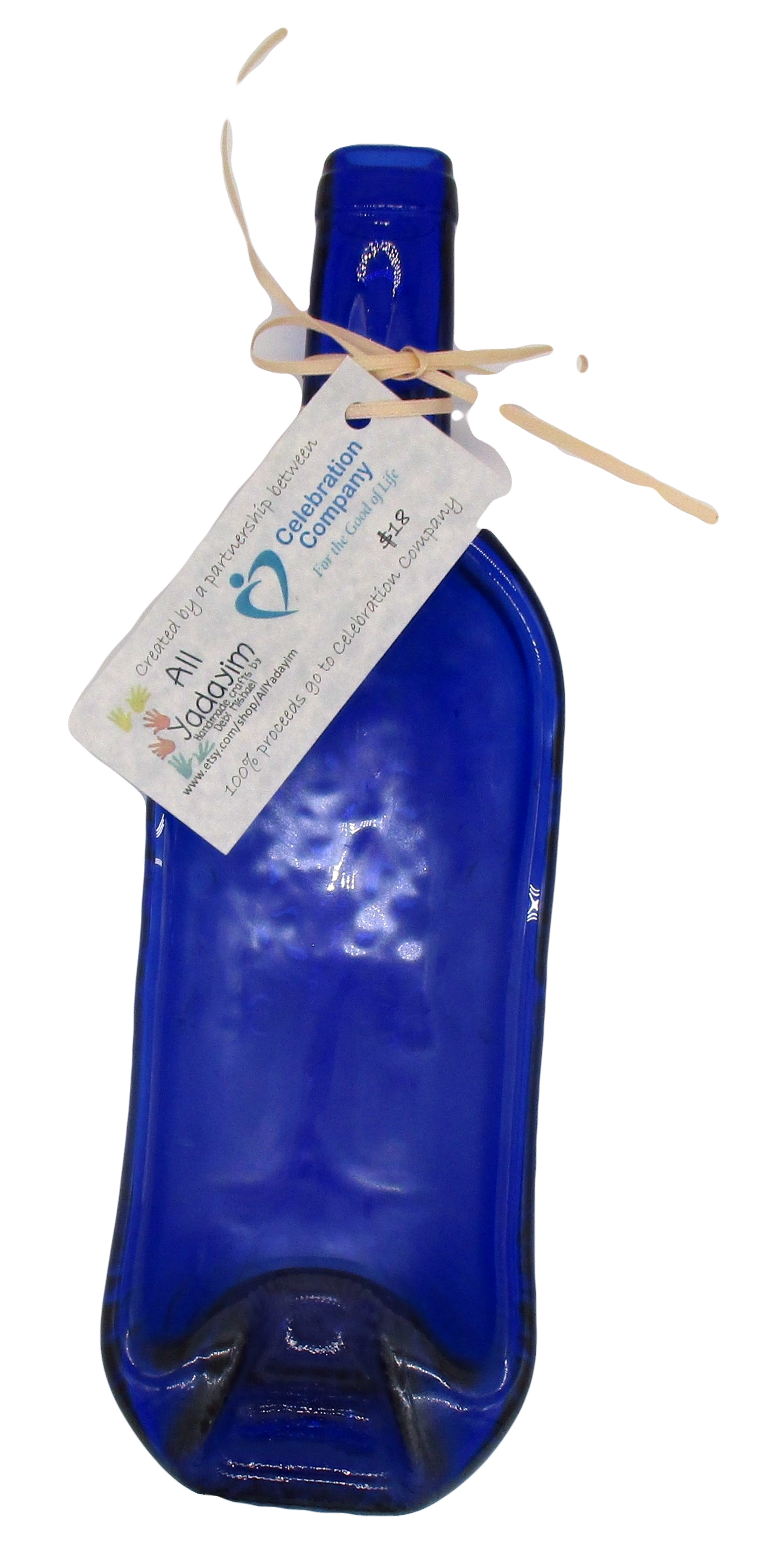 Blue wine bottle that has been melted down and flattened