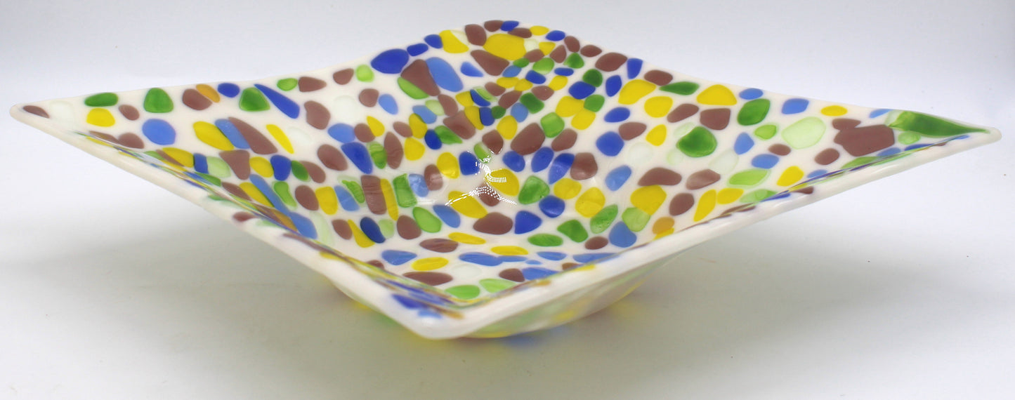 off white glass square bowl with specs of yellow, purple, green, and blue
