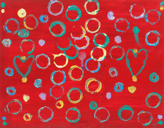 This is a painting with a red background. It has several blue, pink, and yellow circles and two green hearts