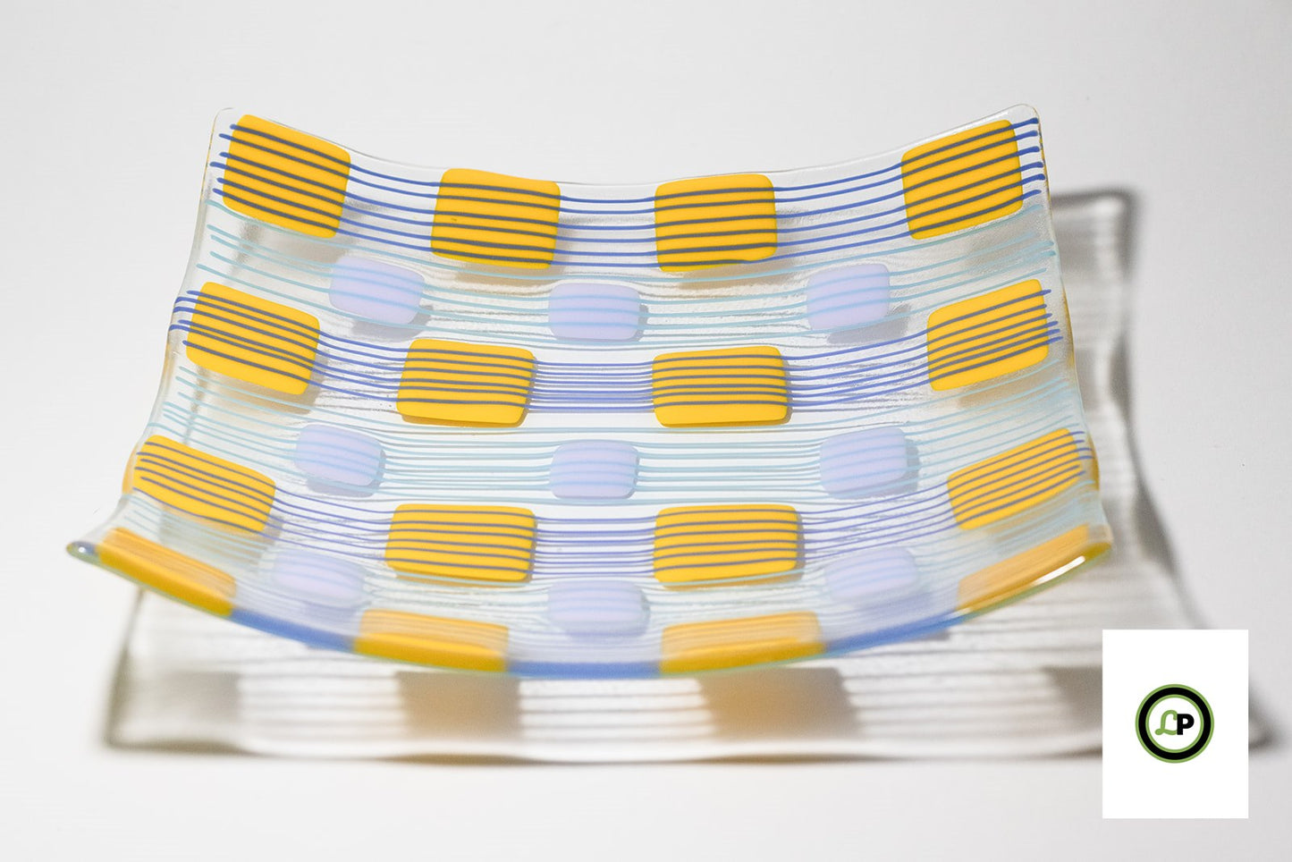 glass plate with squares and lines across