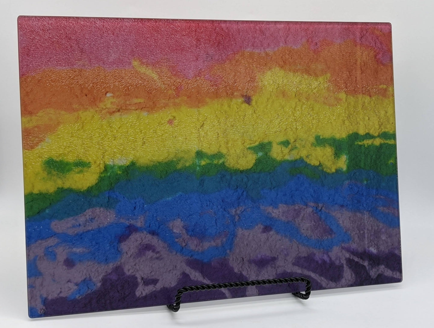 cutting board with the image of horizontal rainbow colors