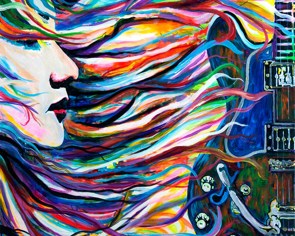 girl with hair flowing and a guitar