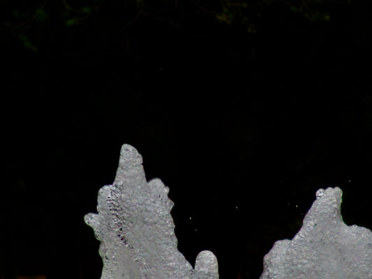photo of white foam against black