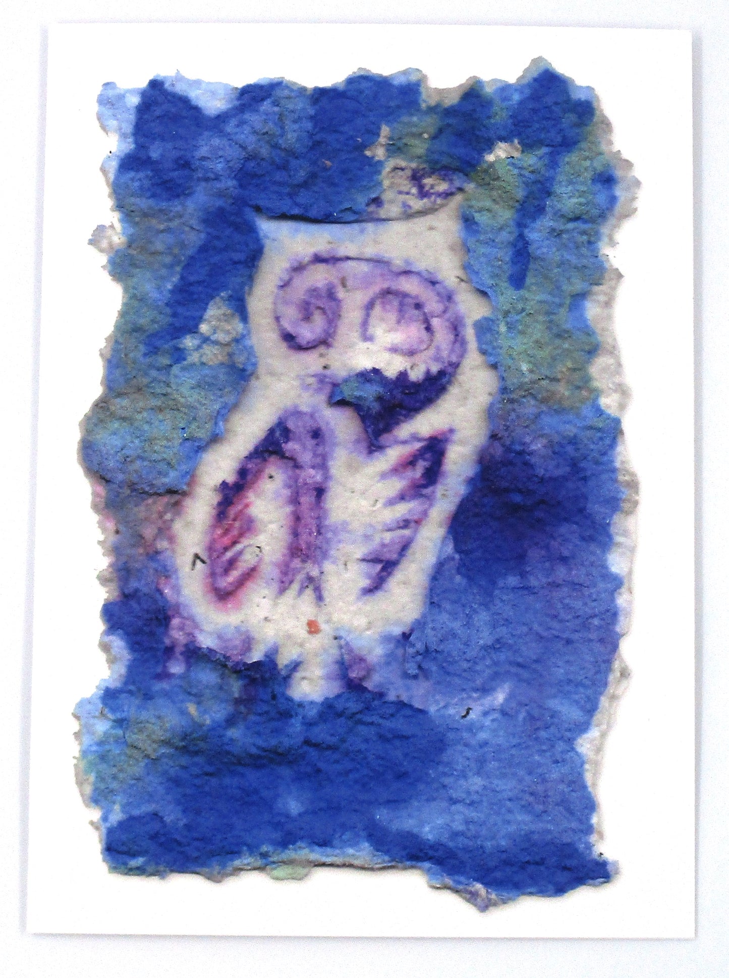 Graphic greeting card with a white owl against a blue background