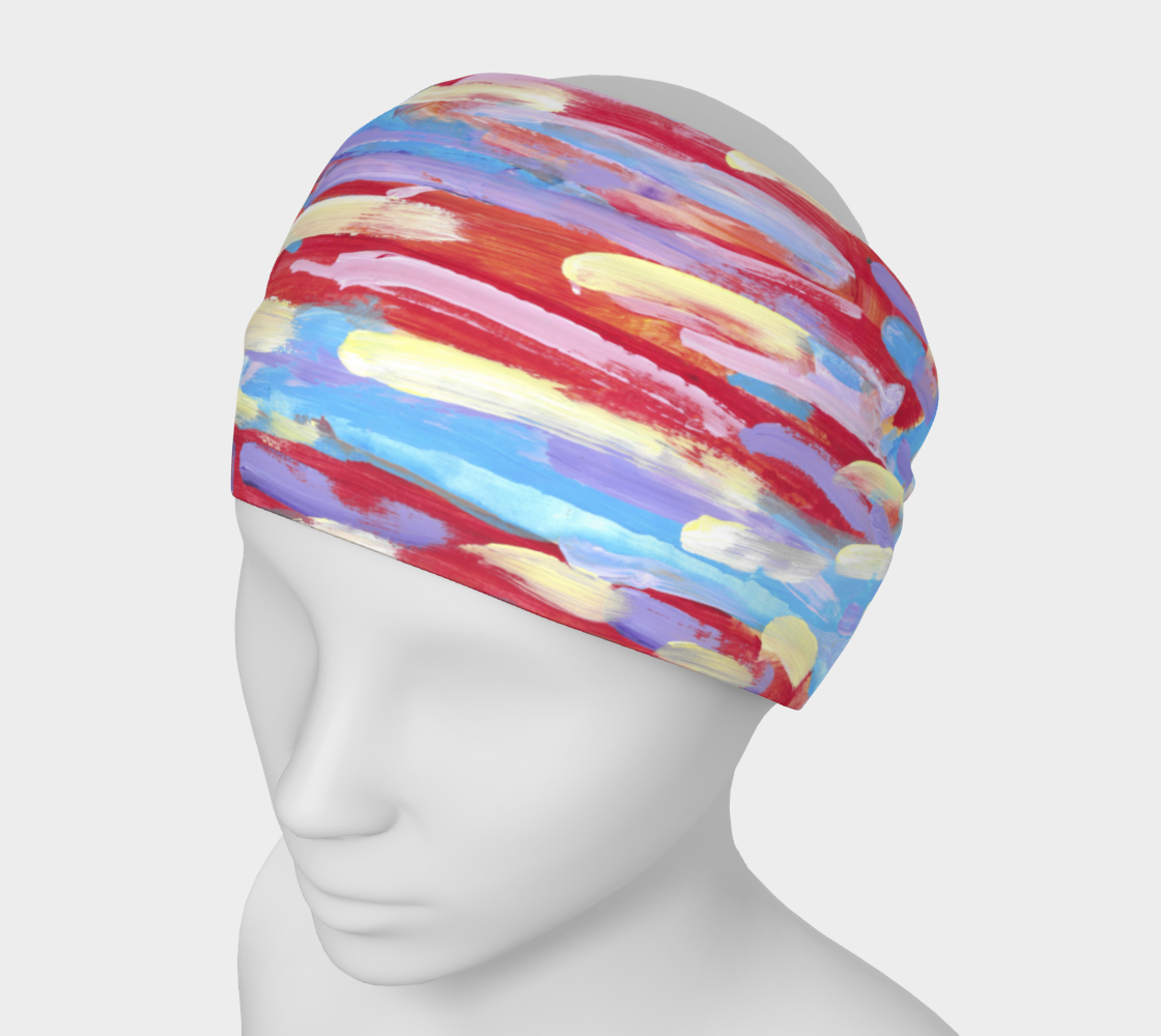 Mannequin wearing headband shown against an orangish-red blackground are pale streaks of pink, yellow, lavender, and sky blue.