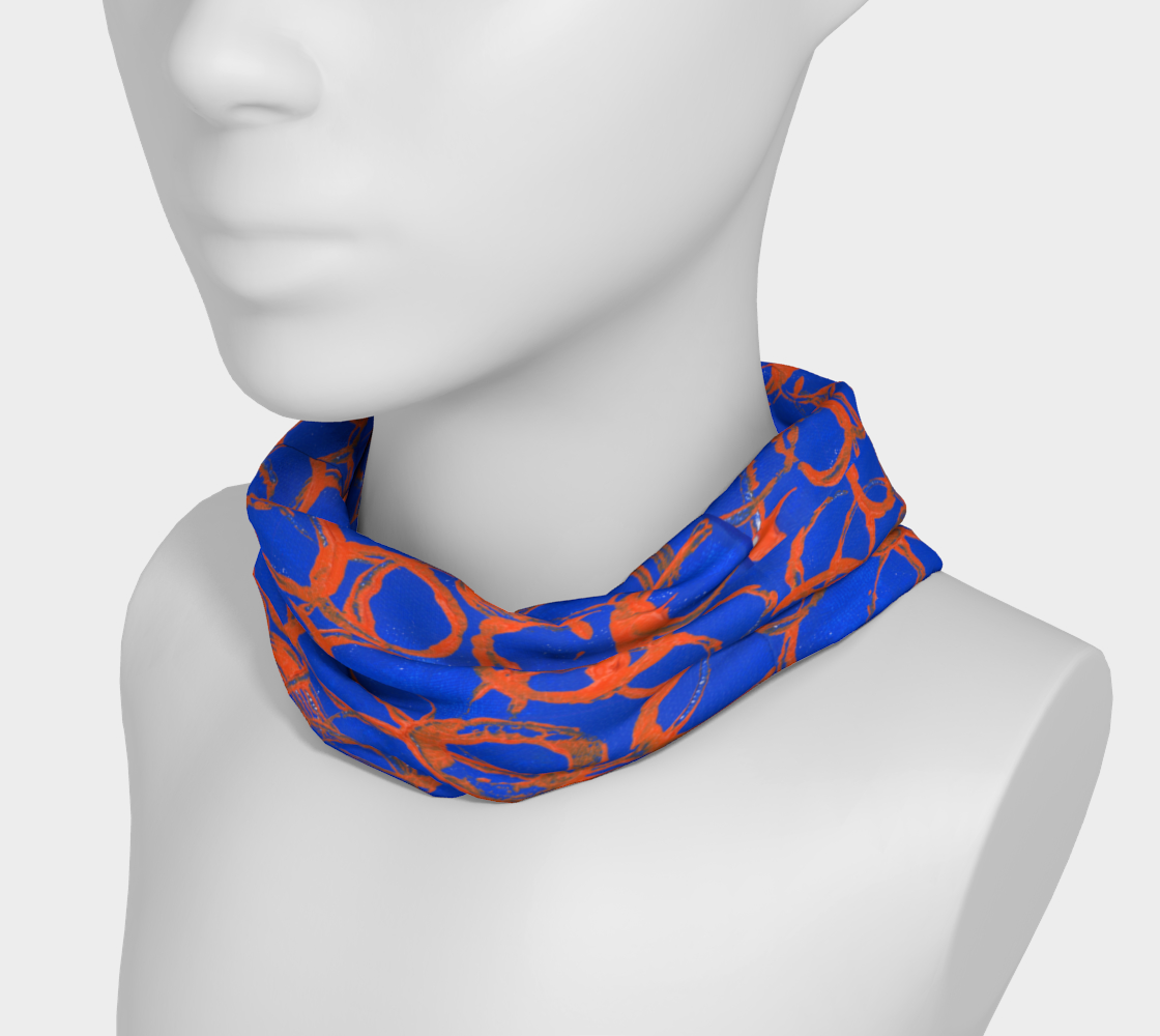 Mannequin wearing around neck, royal blue headband with orange overlapping rings of various sizes