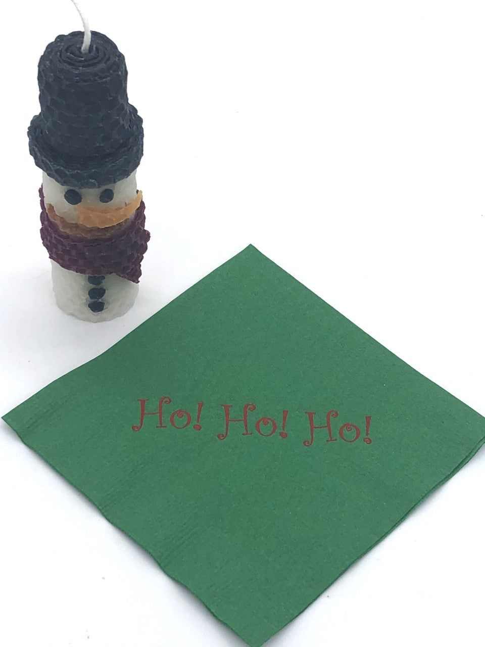 Green cocktail napkin with red Ho! Ho! Ho! slogan