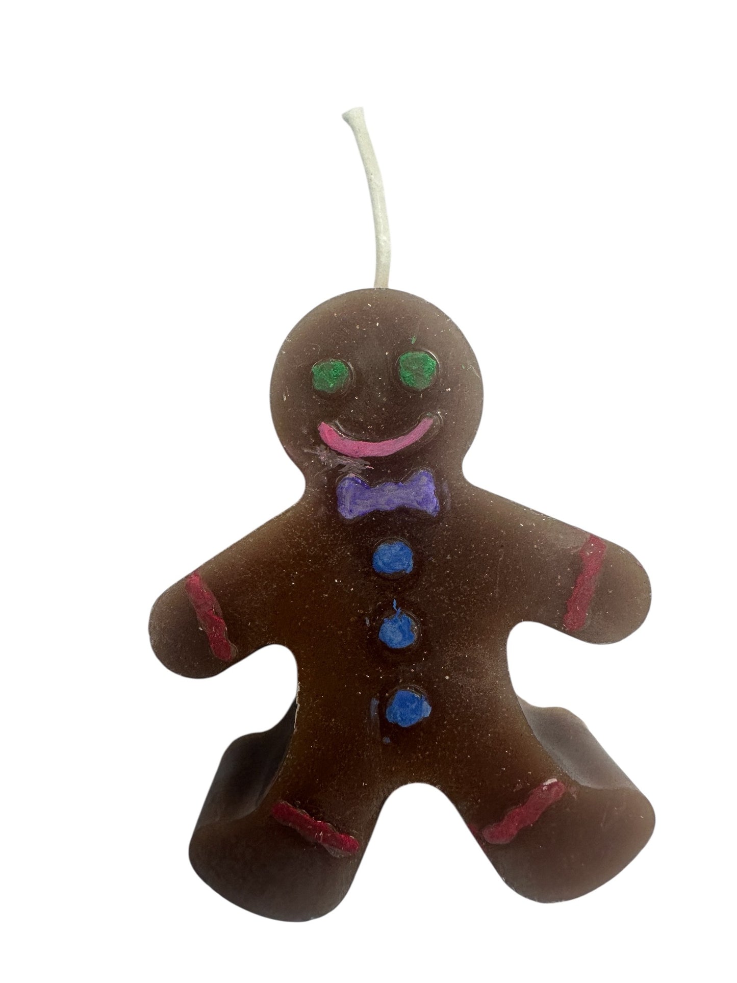 Add a dash of holiday nostalgia to your home with our Gingerbread Man Decorative Candle. Perfectly sculpted to resemble everyone’s favorite seasonal treat, this charming candle brings a warm, whimsical touch to your mantel, coffee table, or holiday spread.