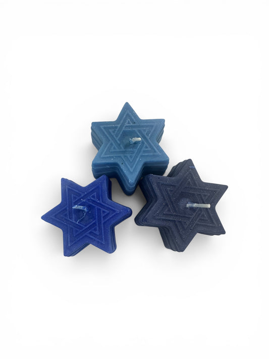  Hand-Poured Star of David Candle Set. Whether you are setting the table for Shabbat, celebrating Hanukkah, or looking for a thoughtful Bar/Bat Mitzvah gift, these candles bring a touch of artisanal elegance to any occasion.

Crafted in three complementary shades of blue from a deep navy to a soft celestial blue this set creates a stunning&nbsp;ombré effect when displayed together.