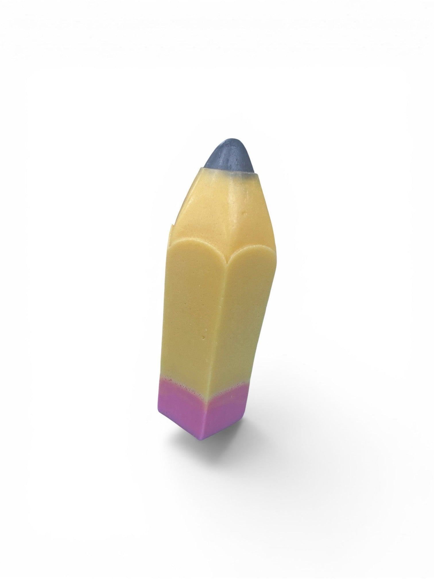 The soap is composed of three distinct, vibrant color blocks that represent the different parts of a classic No. 2 pencil: