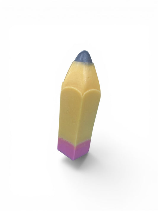 The soap is composed of three distinct, vibrant color blocks that represent the different parts of a classic No. 2 pencil: