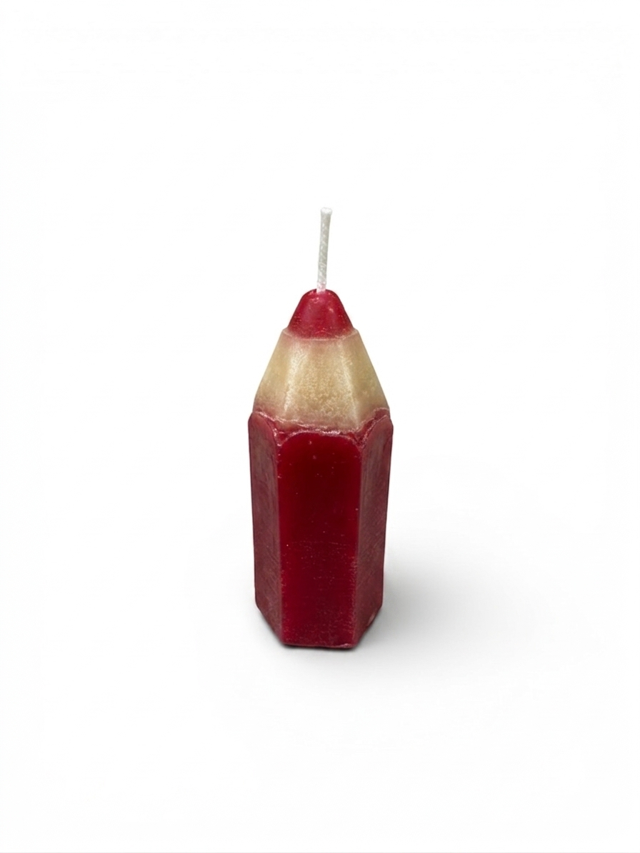 pencil-shaped candles handcrafted by the employees of Celebration Company, featuring a smooth hexagonal texture and a pointed wax tip. (color red)
