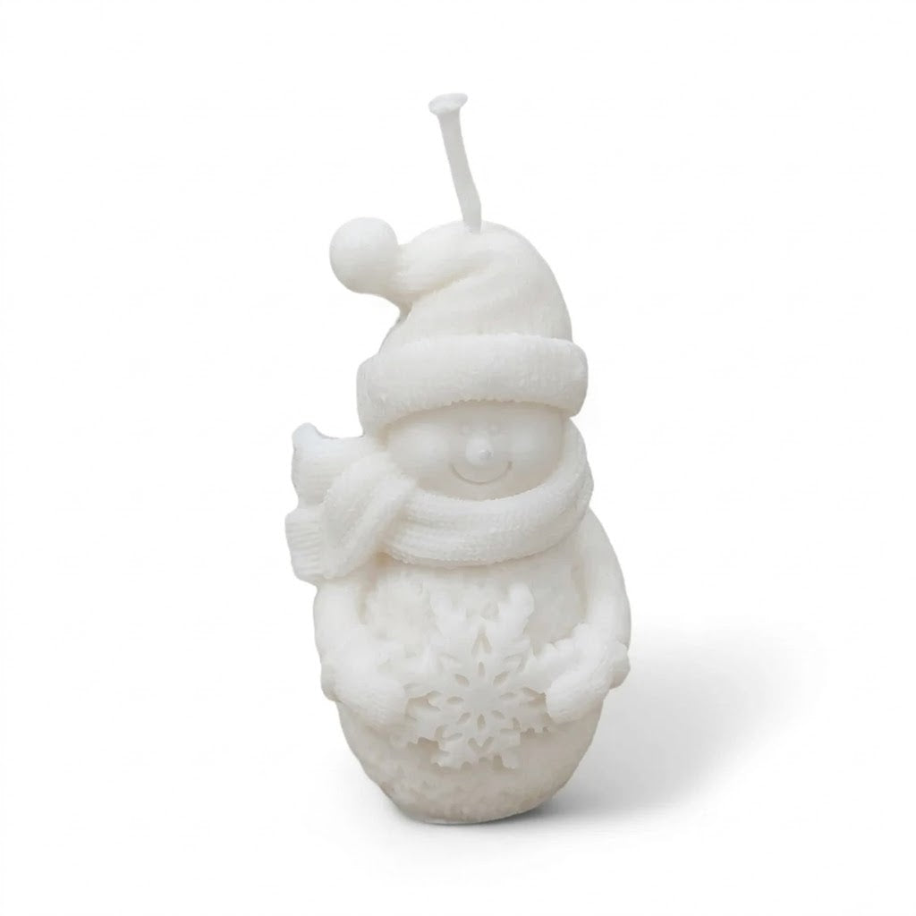 handcrafted snowman candle brings instant winter cheer to any space. white color