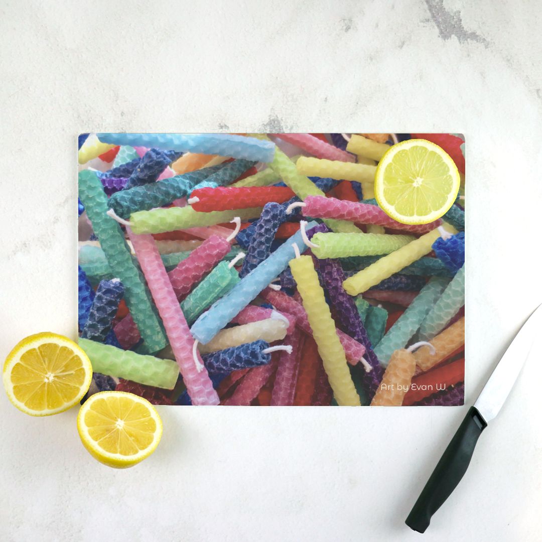 cutting board with image of rolled candles