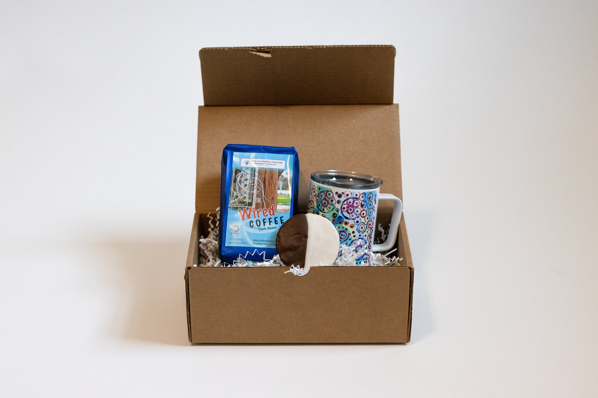 box with mug, coffee, and cookie