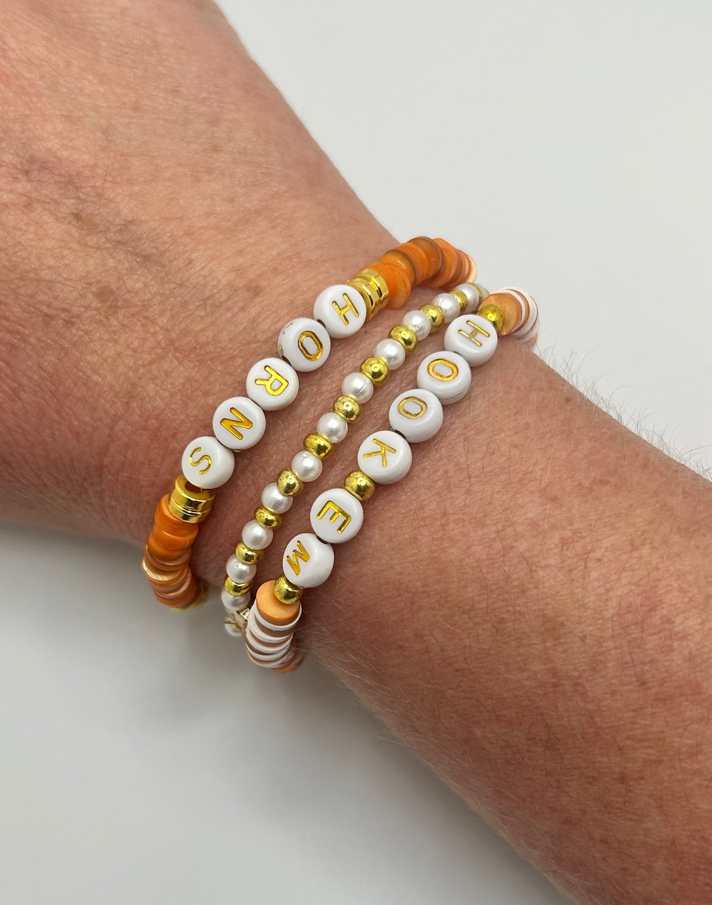 A series of 3 bracelets celebrating UT