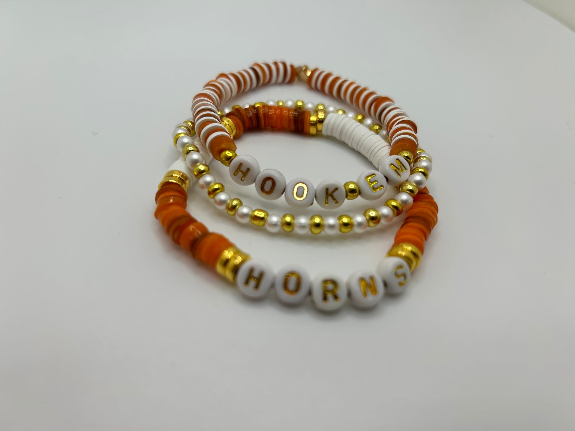 A series of 3 bracelets celebrating UT