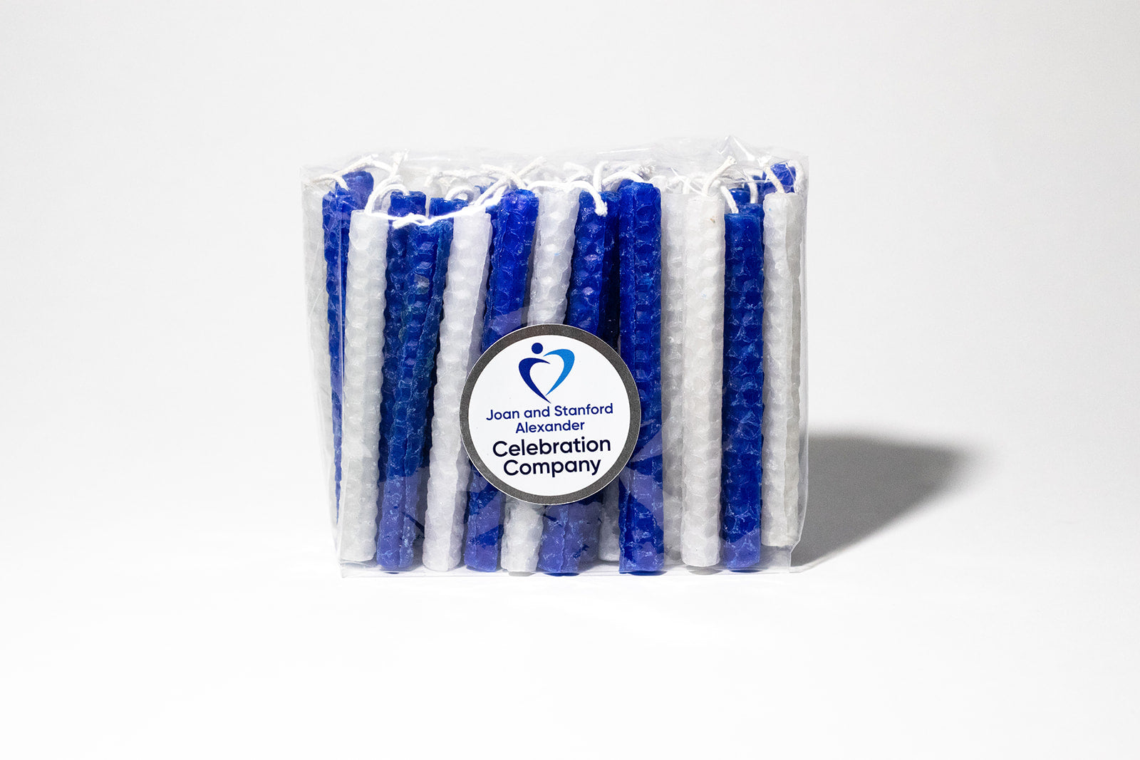 picture of bright blue and white candles in a bag