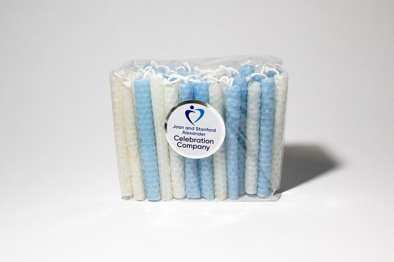 picture of light blue and white candles in a bag