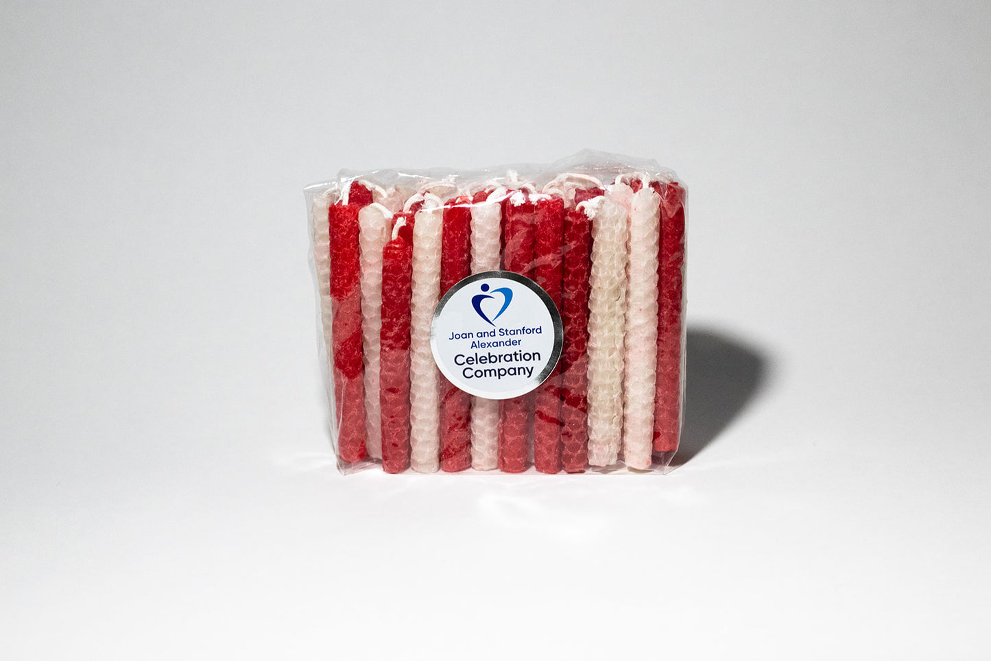 Packages of 44 Chanukah candles in red and white