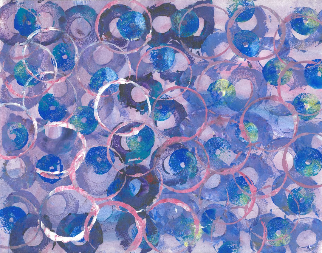 Abstract painting of pink and blue circles on a lavender background