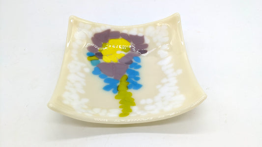 tan glass bowl with flower pattern
