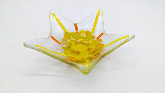 star shaped glass bowl with yellow inside