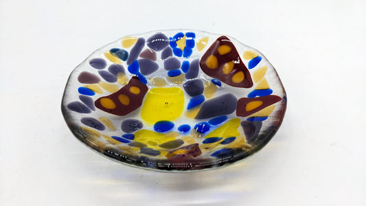 glass trinket dish with transparent red, purple, and yellow