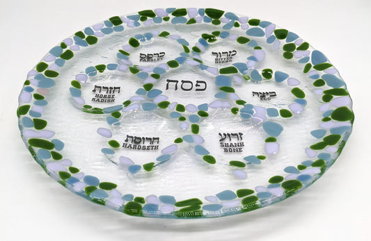 seder plate with circles of green, blue and purple pieces