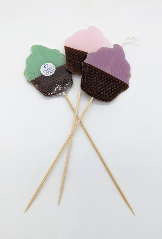 3 cupcake candles on a stick